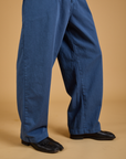 Pant leg side view close up of Baggy Mid-Rise Trousers in French Blue on Jerrod