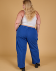Baggy Mid-Rise Trousers in Royal Blue back view on Juliet
