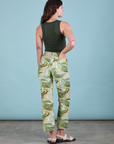 Back view of Work Pants in Ocean and Sky and swamp green Tank Top on Alex