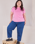 Ashley is 5'7" and wearing L Organic Vintage Tee in Bubblegum Pink paired with dark wash Trouser Jeans