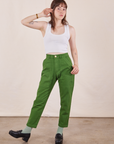 Hana is wearing Petite Pencil Pants in Lawn Green and Cropped Tank Top in vintage tee off-white 