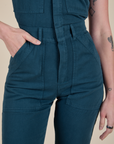 Close up of Short Sleeve Jumpsuit in Lagoon on Alex