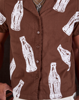 Soda Bottle Pantry Button-Up in Fudgesicle Brown front close up on Jerrod