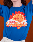 Sunny Los Angeles Tourist Tee close up on Alex