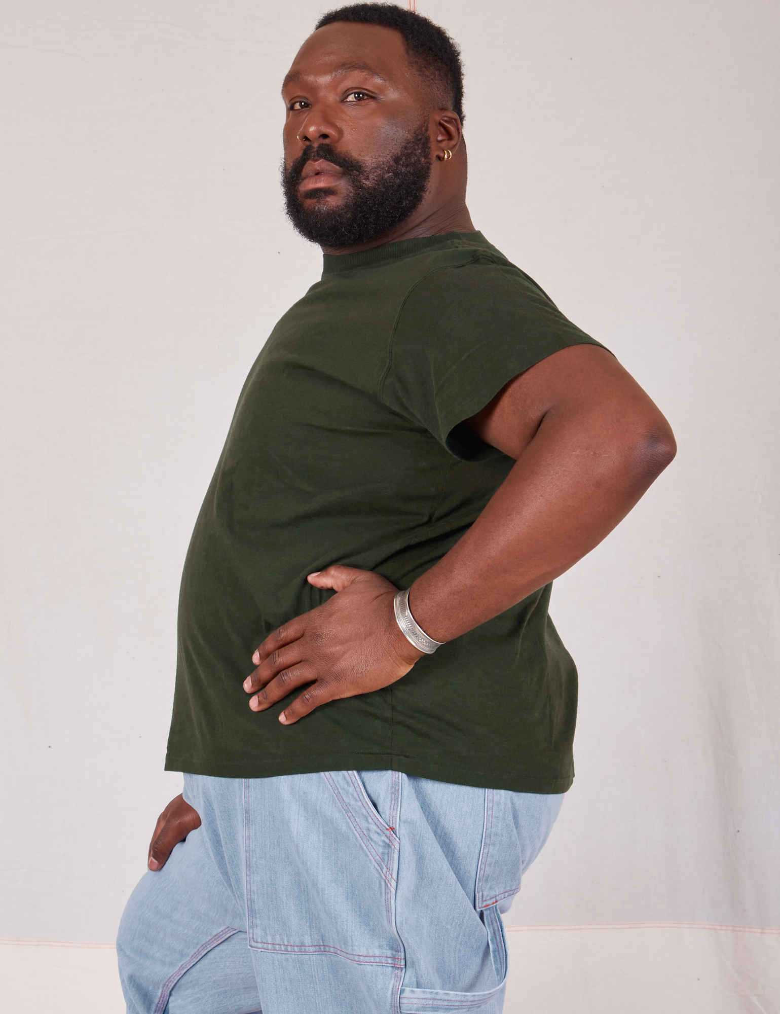 Organic Vintage Tee in Swamp Green side view on Elijah