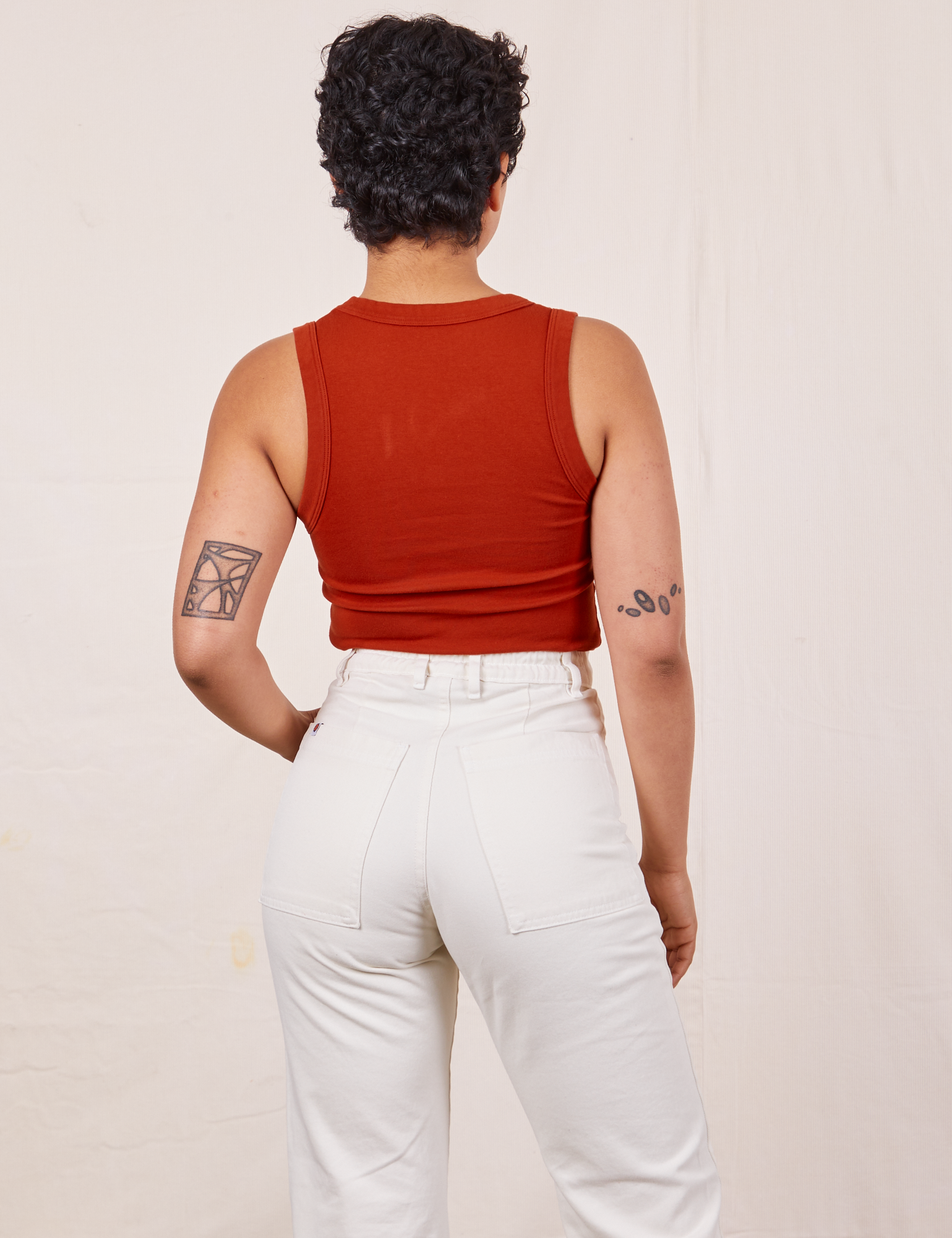 Tank Top in Paprika back view on Mika wearing vintage tee off-white Western Pants