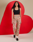 Work Pants in Hot Stuff Print and black Cropped Tank on Shahana