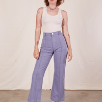 Alex is 5'8" and wearing XS Western Pants in Faded Grape paired with vintage off-white Tank Top