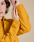 Denim Work Jacket in Mustard Yellow sleeve close up on Hana
