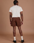 Back view of Classic Work Shorts in Fudgesicle Brown and Organic Vintage Tee in Vintage Off White on Isaac