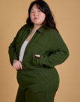Angled front view of Heritage Mechanic Jacket in Evergreen on Ashley