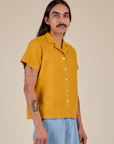 Pantry Button-Up in Mustard Yellow angled front view on Anthony