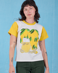 Alex is 5’8” and wearing P Anniversary Tee in Lemon