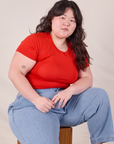 Ashley is wearing Baby Tee in Mustang Red