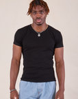 Isaac is 5'10" and wearing L Baby Tee in Vintage Basic Black