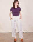 Hana is wearing Baby Tee in Nebula Purple and vintage off-white Trousers