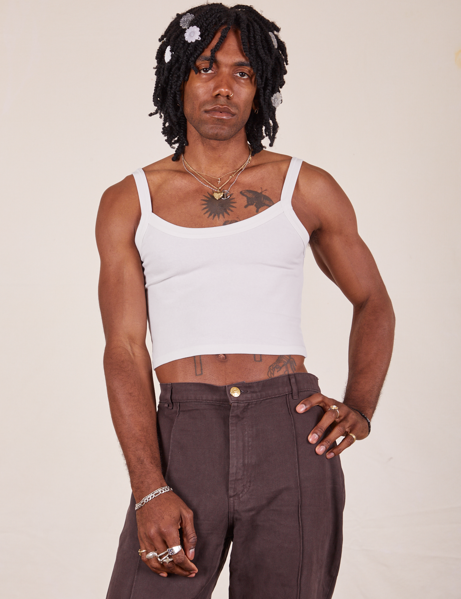Jerrod is 6&#39;3&quot; and wearing S Cropped Cami in Vintage Tee Off-White paired with espresso brown Western Pants