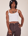 Jerrod is 6'3" and wearing S Cropped Cami in Vintage Off-White paired with espresso brown Western Pants