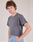 Cropped Burly Tee in Washed Grey angled front view on Quinn