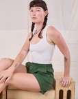 Easy Shorts in Dark Emerald Green and Cropped Tank in vintage tee off-white worn by Alex