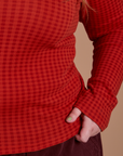 Close up of Gingham Long Sleeve Baby Tee in Mustang Red on Juliet