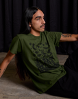Anthony is wearing Vintage Tee in Papercut