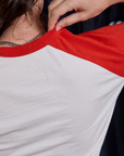 Raglan Tee in Dracula shoulder close up on Alex