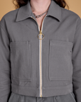 Front close up of Heritage Mechanic Jacket in Washed Grey on Alex