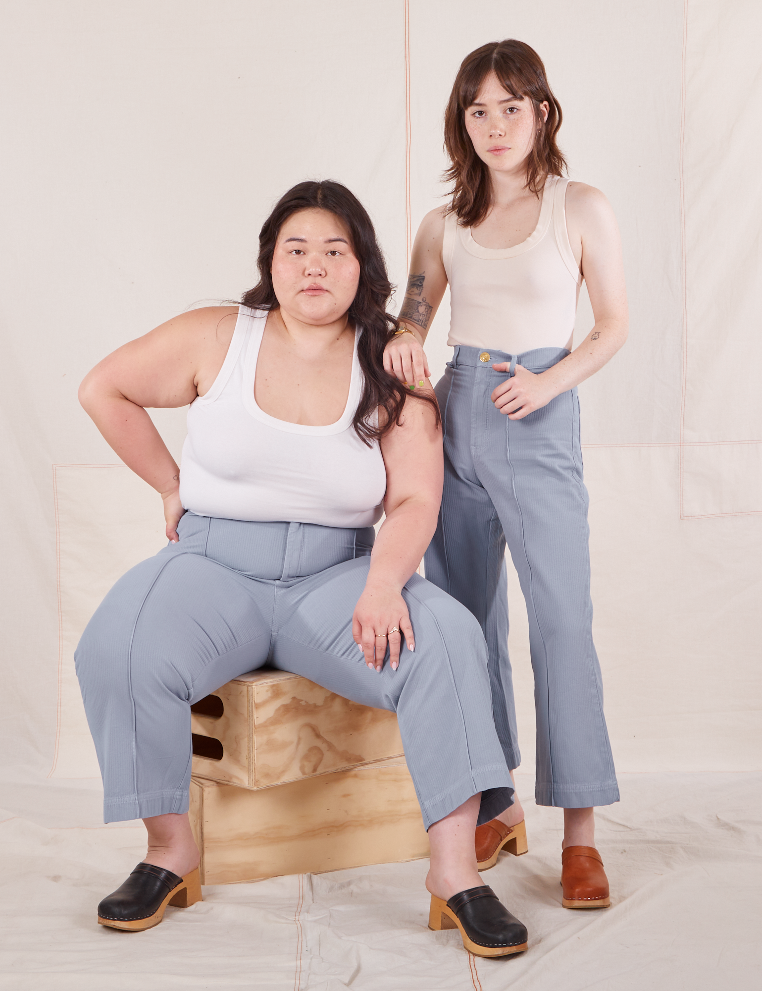 Hana and Ashley are both wearing Heritage Westerns in Periwinkle paired with Cropped Tank Top in vintage tee off-white