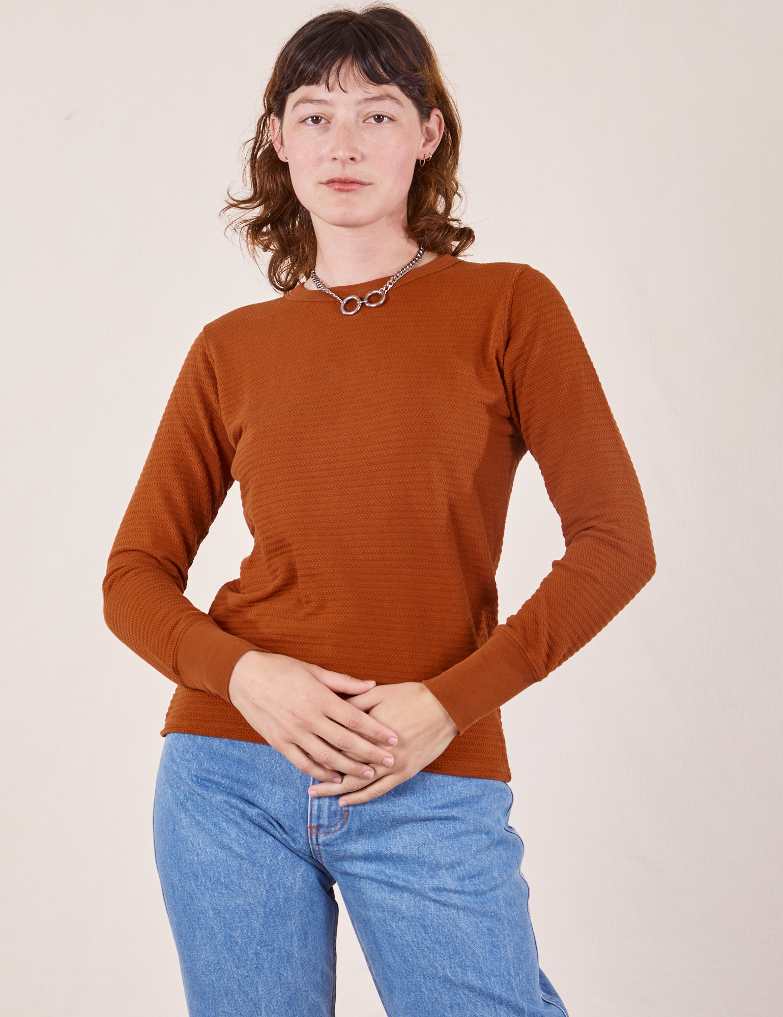 Alex is wearing P Honeycomb Thermal in Burnt Terracotta