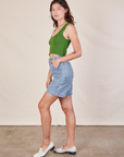 Side view of Carpenter Shorts in Light Wash and lawn green Cropped Tank