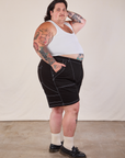 Side view of Carpenter Shorts in Basic Black and Cropped Tank in vintage tee off-white on Sam