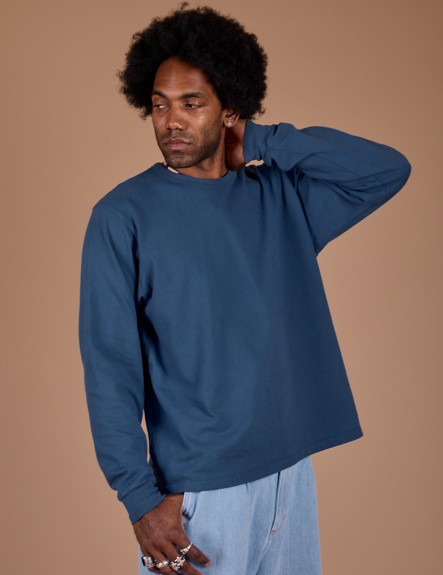 Angled front view of Long Sleeve Burly Tee in French Blue on Jerrod