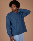 Angled front view of Long Sleeve Burly Tee in French Blue on Jerrod