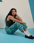 Shahana is wearing Work Pants in Angel Print and swamp green Cropped Tank