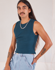 Muscle Tee in Lagoon angled front view on Anthony