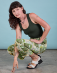 Work Pants in Ocean and Sky and swamp green Tank Top on Alex