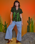Alex is 5'8" and wearing XXS Paintstamped Pantry Button-Up in Cactus