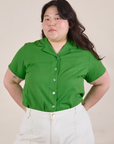 Ashley is wearing Pantry Button-Up in Kelly Green tucked into vintage tee off-white Western Pants