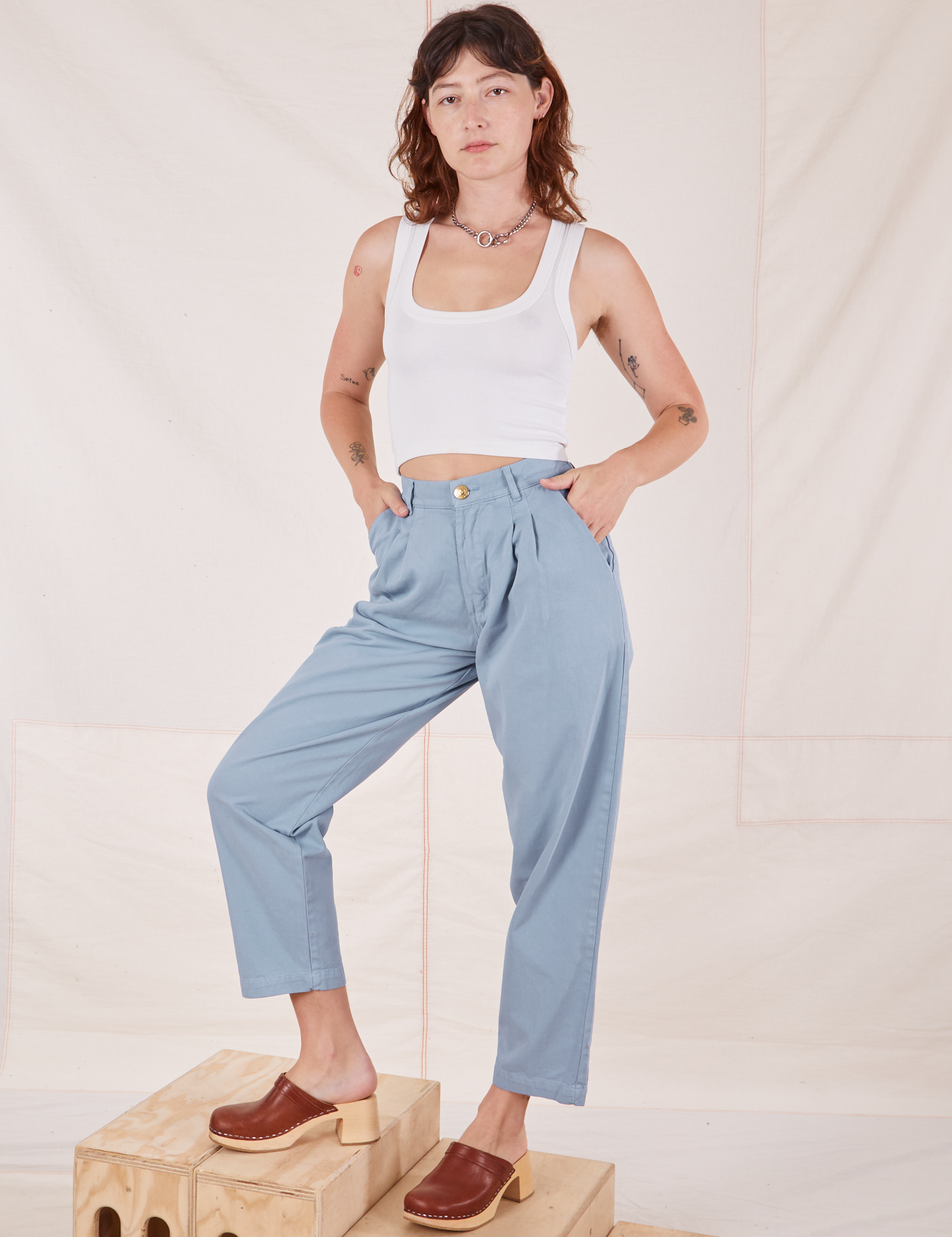 Alex is 5&#39;8&quot; and wearing XXS Heavyweight Trousers in Periwinkle paired with vintage off-white Cropped Tank Top