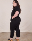 Petite Short Sleeve Jumpsuit in Basic Black side view worn by Ashley
