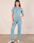 Alex is 5'8" and wearing XXS Short Sleeve Jumpsuit in Baby Blue