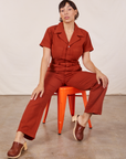 Tiara is wearing Short Sleeve Jumpsuit in Paprika
