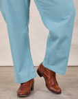Work Pants in Baby Blue pant leg close up on Miguel