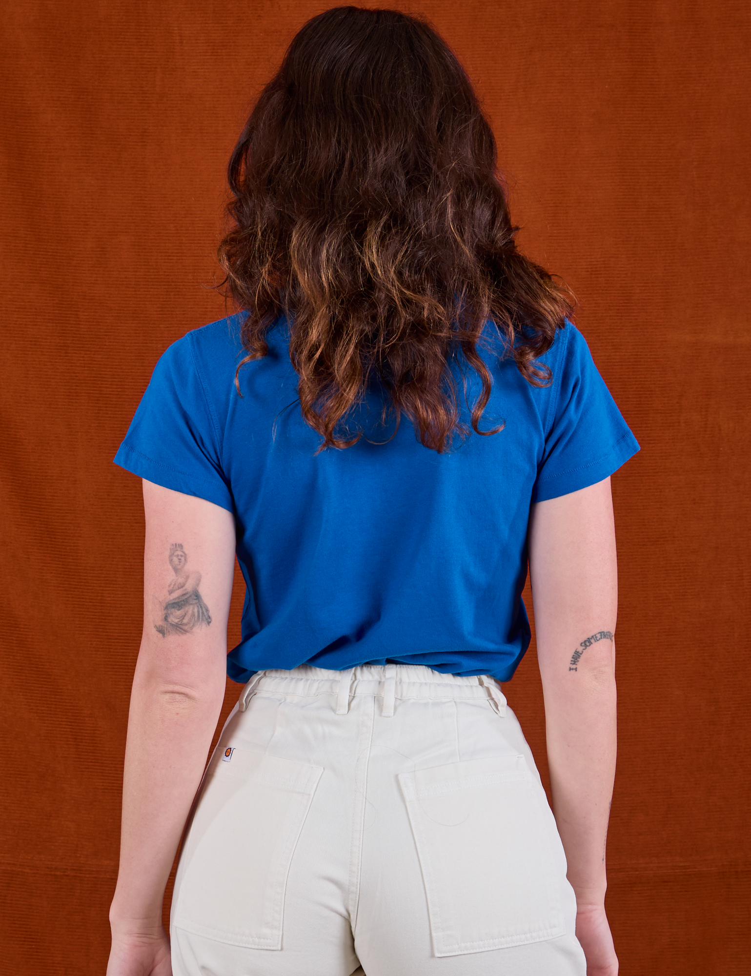Sunny Los Angeles Tourist Tee back view on Alex
