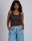 Kandia is 5’4” and wearing P The Tank Top in Espresso Brown
