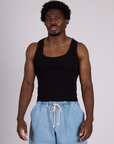 Isaac is 5’10” and wearing M The Tank Top in Basic Black