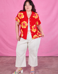 Ashley is wearing Paintstamped Pantry Button-Up in Mustang Red paired with vintage tee off-white Western Pants