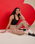 Work Pants in Hot Stuff Print and black Cropped Tank worn by Shahana