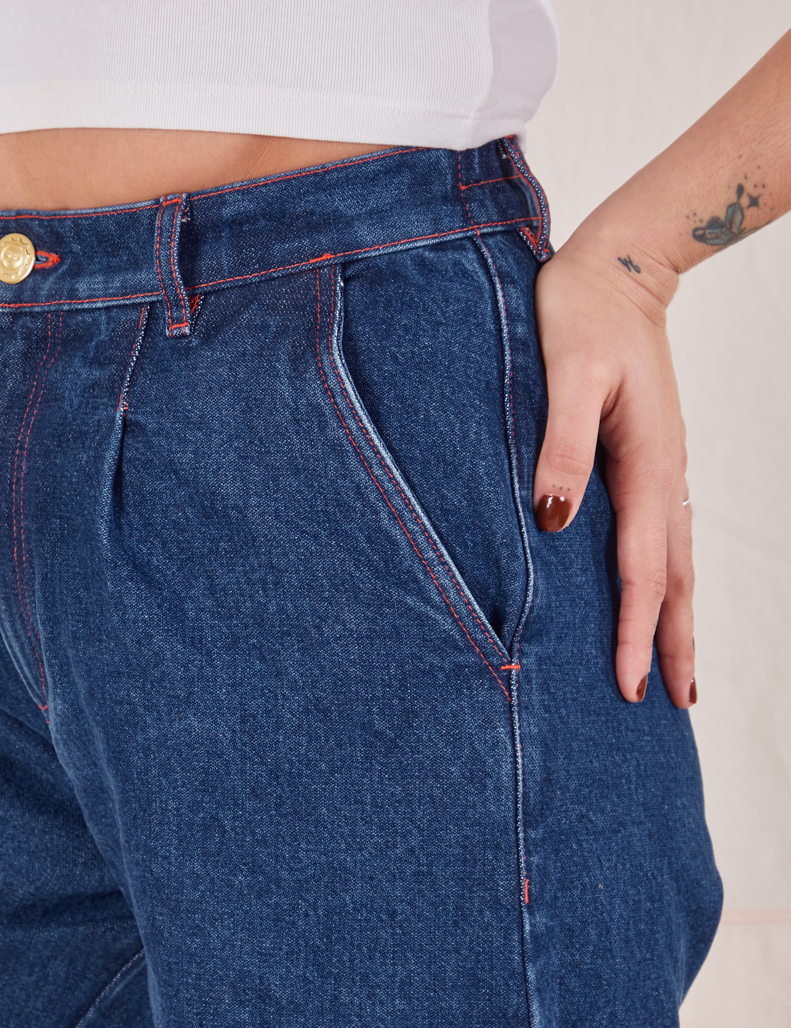 Indigo Wide Leg Trousers in Dark Wash front pocket close up on Betty